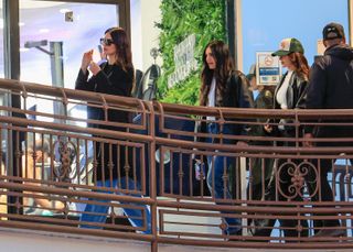 Kendall Jenner wearing a black jacket and wide-leg jeans to Sushi Park in Los Angeles May 2024