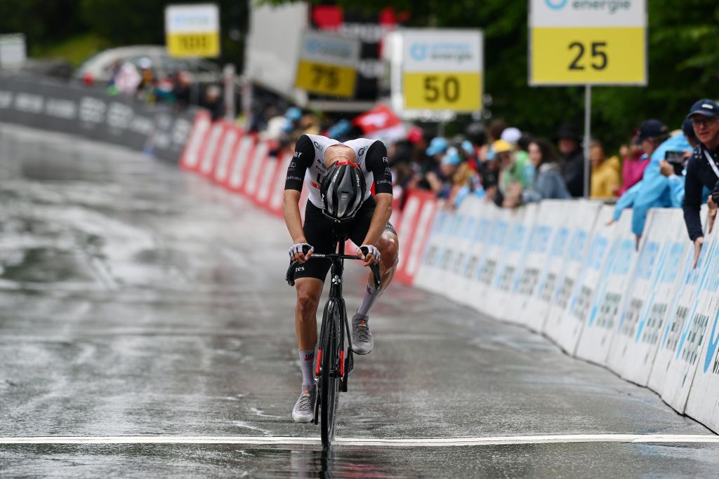 VILLARSSUROLLON SWITZERLAND JUNE 13 Juan Ayuso of Spain and UAE Team Emirates crosses the finish line as third place during the 86th Tour de Suisse 2023 Stage 3 a 1438km stage from Tafers to VillarssurOllon 1256m UCIWT on June 13 2023 in VillarssurOllon Switzerland Photo by Dario BelingheriGetty Images