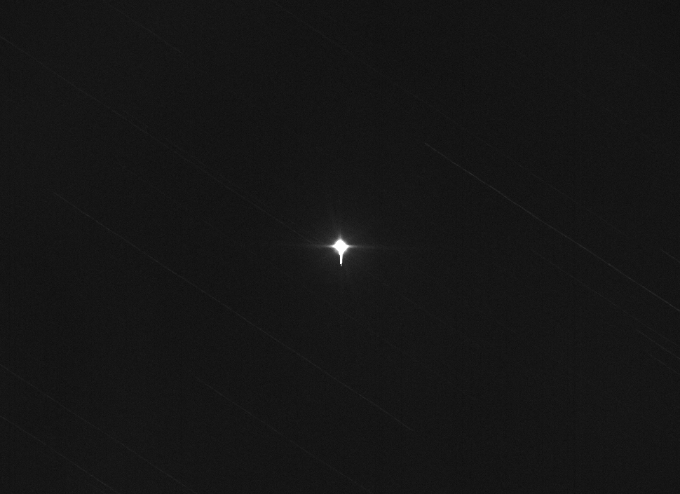 iss space station seen through telescope