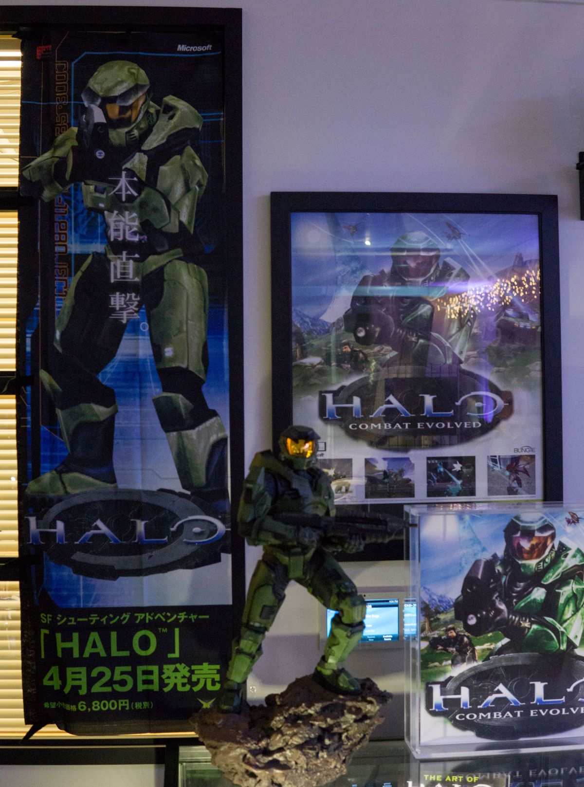 A Japanese cloth print advertising the original Halo's release in Japan, among other Halo 1 memorabilia.