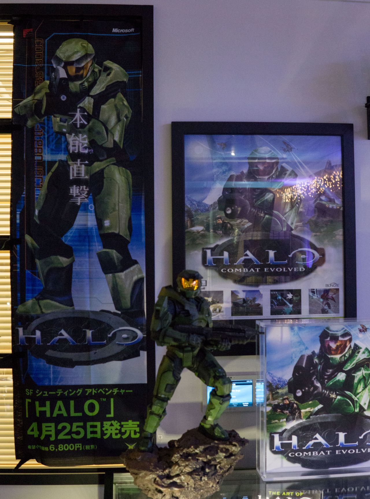 A Japanese cloth print advertising the original Halo's release in Japan, among other Halo 1 memorabilia.