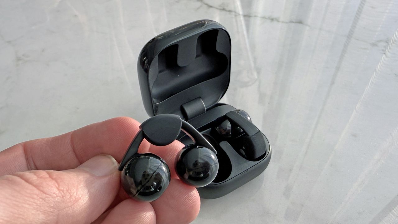 Sony LinkBuds Clip in a man's hand