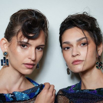 two models for giorgio armani wearing soft girl makeup