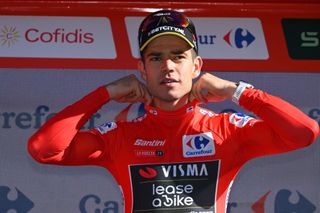 OUREM PORTUGAL AUGUST 18 Wout van Aert of Belgium and Team Visma Lease a Bike celebrates at podium as Red Leader Jersey winner during the 79th La Vuelta Ciclista a Espana 2024 Stage 2 a 194km stage from Cascais to Ourem UCIWT on August 18 2024 in Ourem Portugal Photo by Tim de WaeleGetty Images