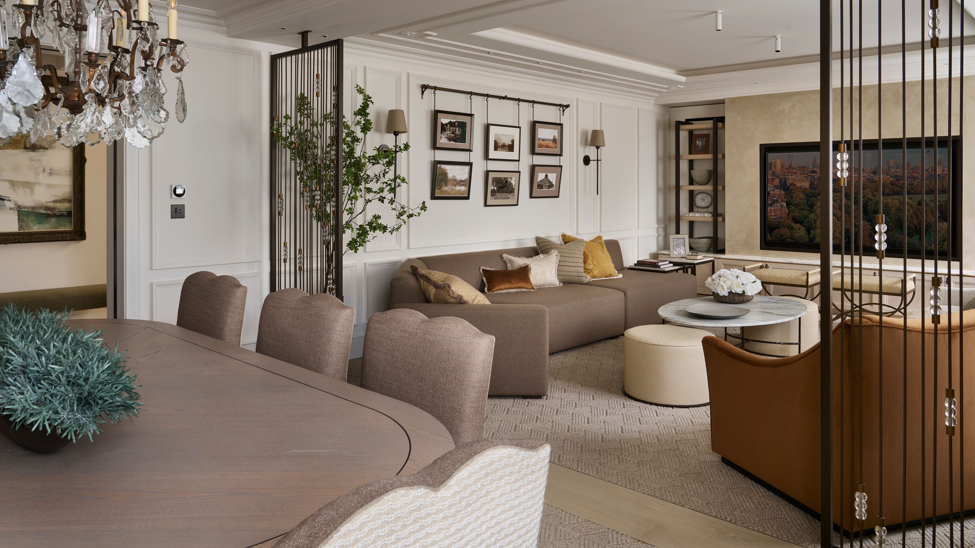 a quiet luxury apartment's open plan living room and dining spaces