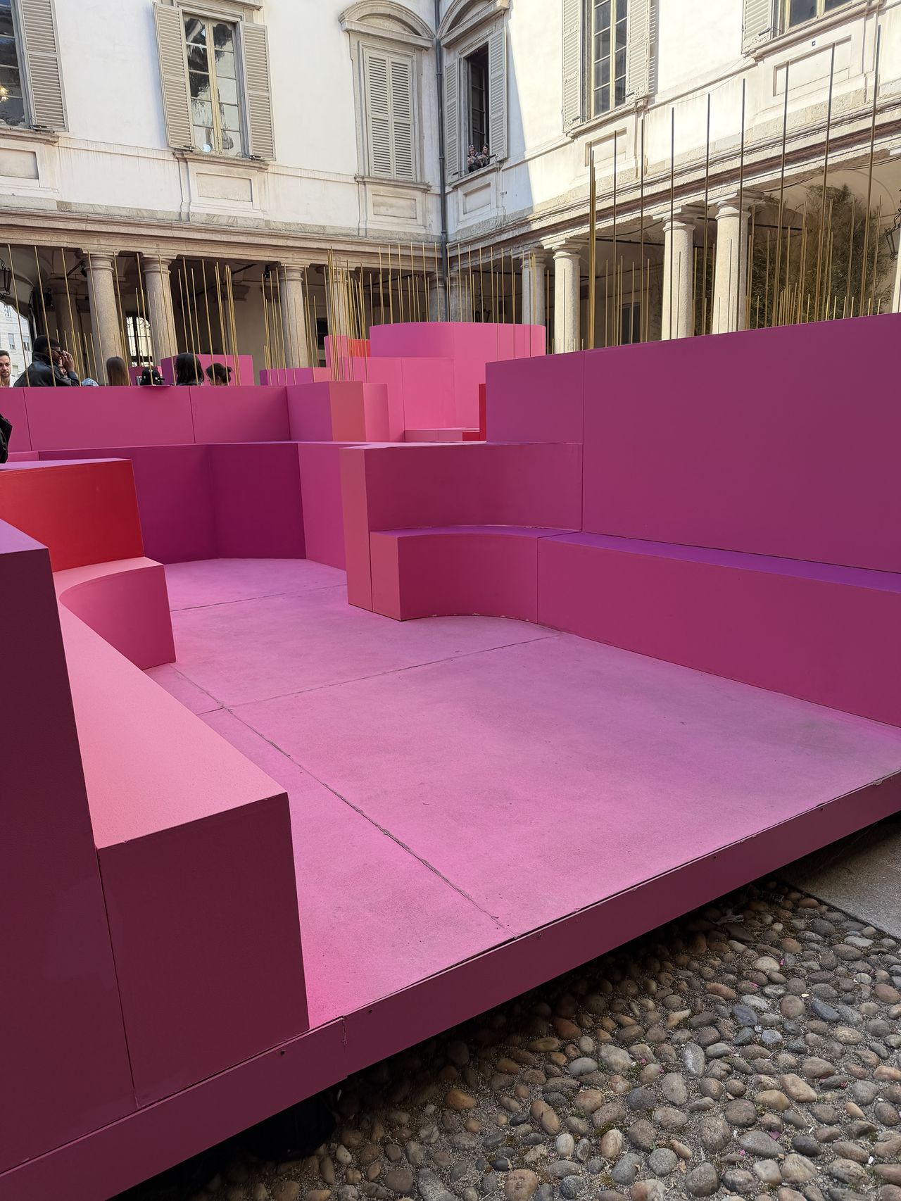 a bright pink maze installation