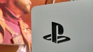 PS5 review; a photo of the PS5 logo