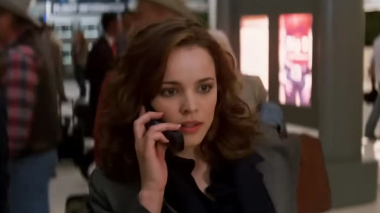 Rachel McAdams on her cell phone in Red Eye waiting at the airport after her flight is delayed. 