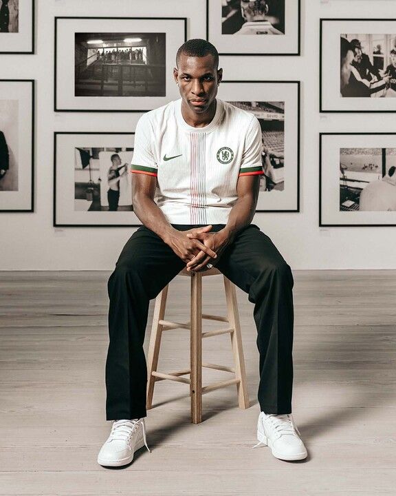 Chelsea striker Nicolas Jackson poses in the club's new away kit for the 2025/26 season