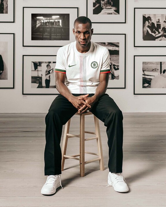 Chelsea striker Nicolas Jackson poses in the club's new away kit for the 2025/26 season