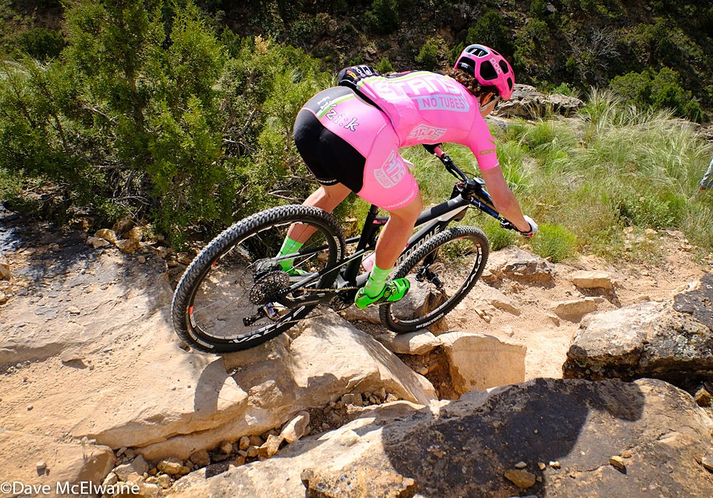 Jenny Smith (Stans NoTubes) riding a drop-off