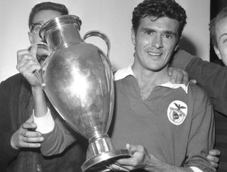 Benfica captain Jose Aguas holds the European Cup, 1962