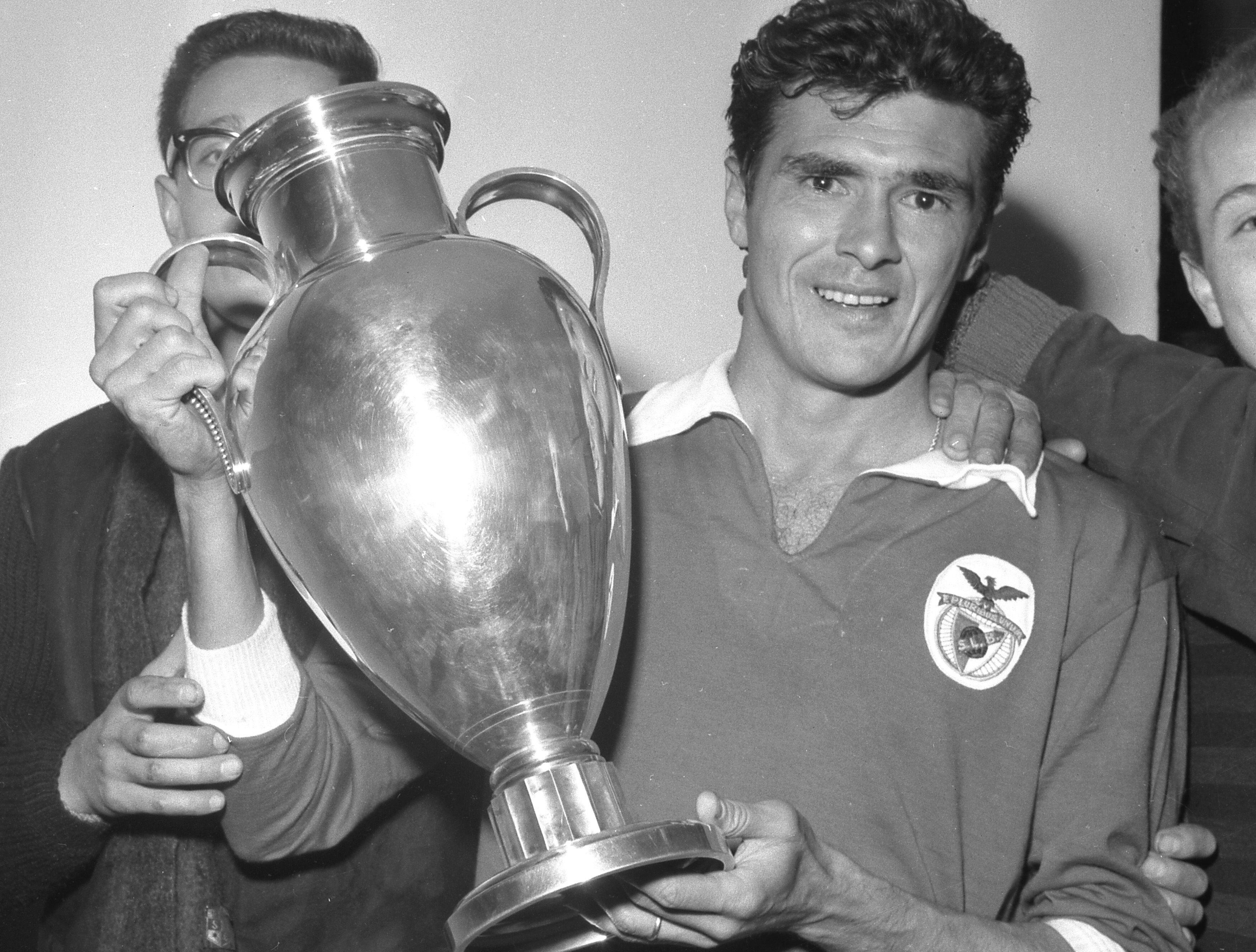 Benfica captain Jose Aguas holds the European Cup, 1962