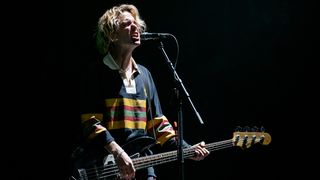 Conor Deegan III of Fontaines D.C. performs at Wythenshawe Park on August 15, 2025 in Wythenshawe, England