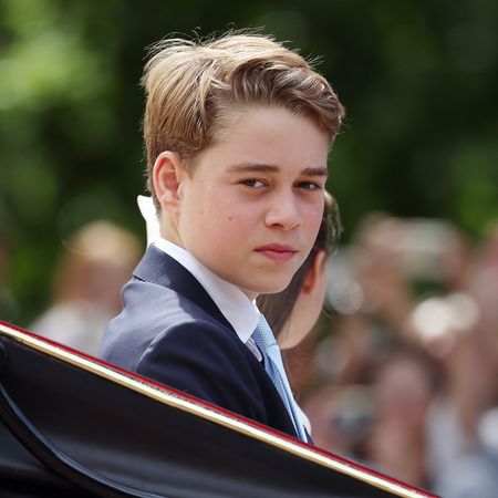 Prince George riding in a carriage