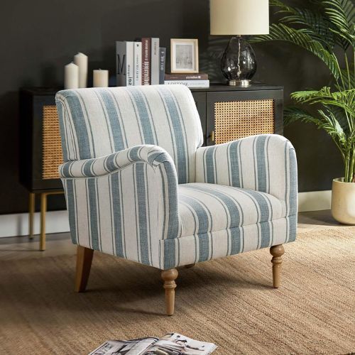 Blue and white striped armchair in living room