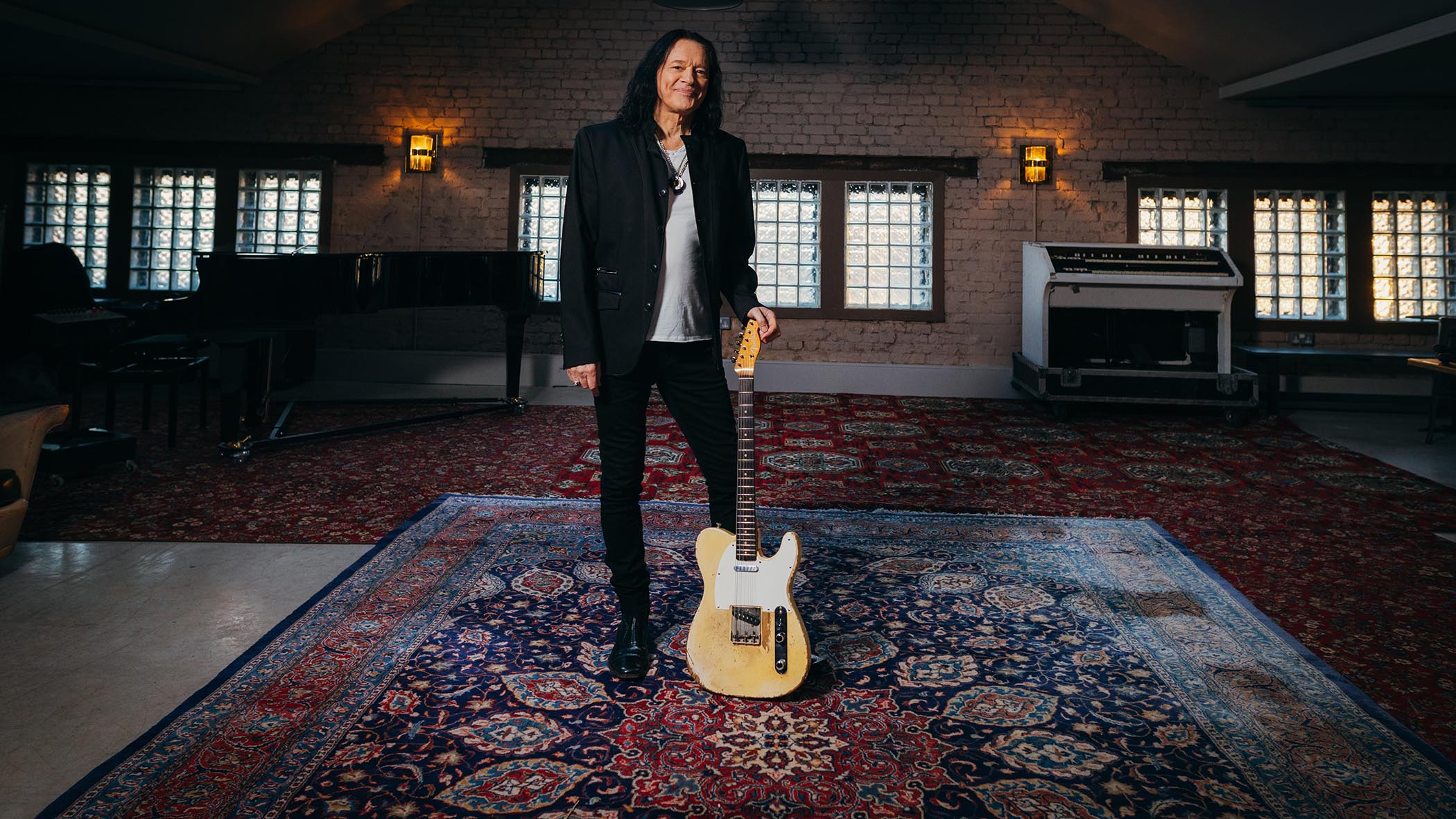 Robben Ford is photographed at Olympic Studios with his trusty whiteguard Fender Telecaster.