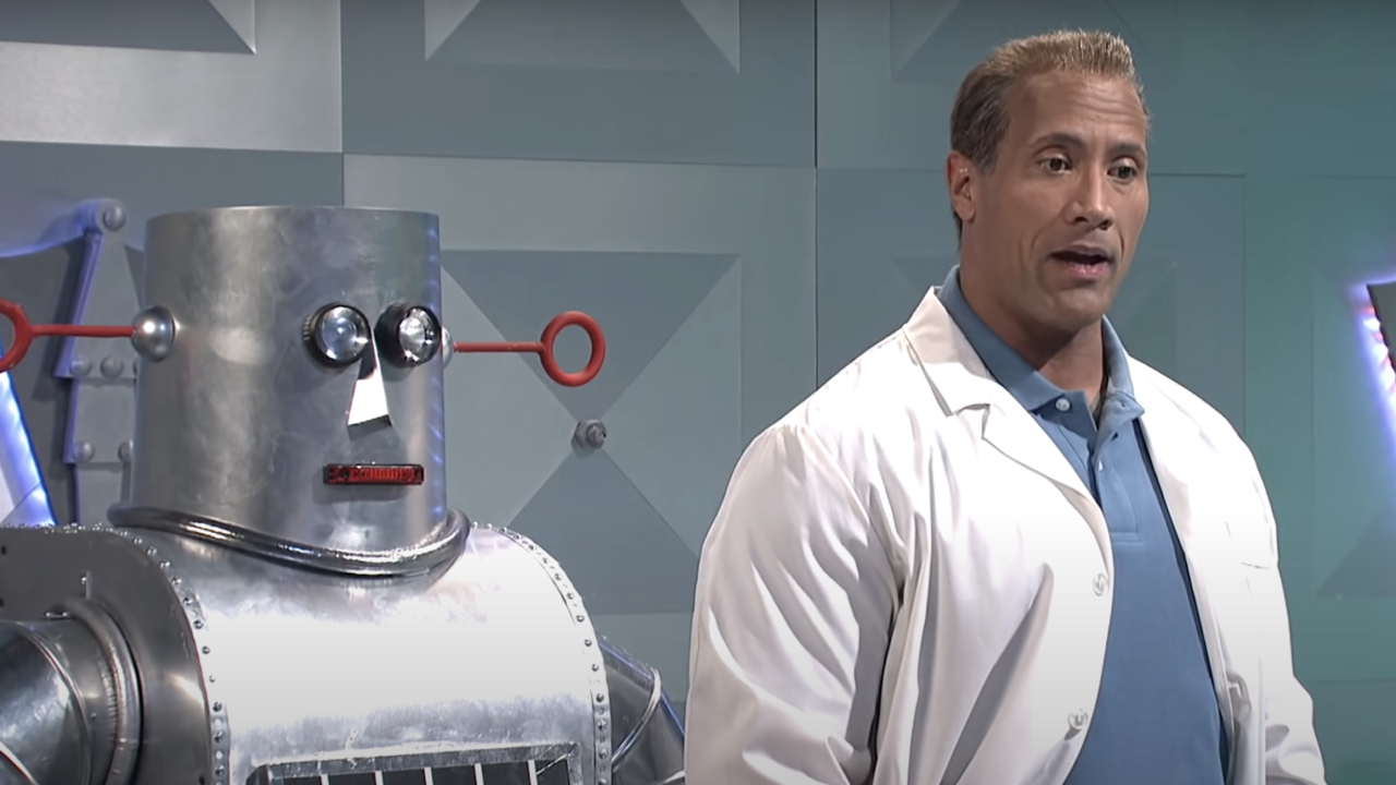 Dwayne Johnson as a mad scientist with his robot invention on Saturday Night Live