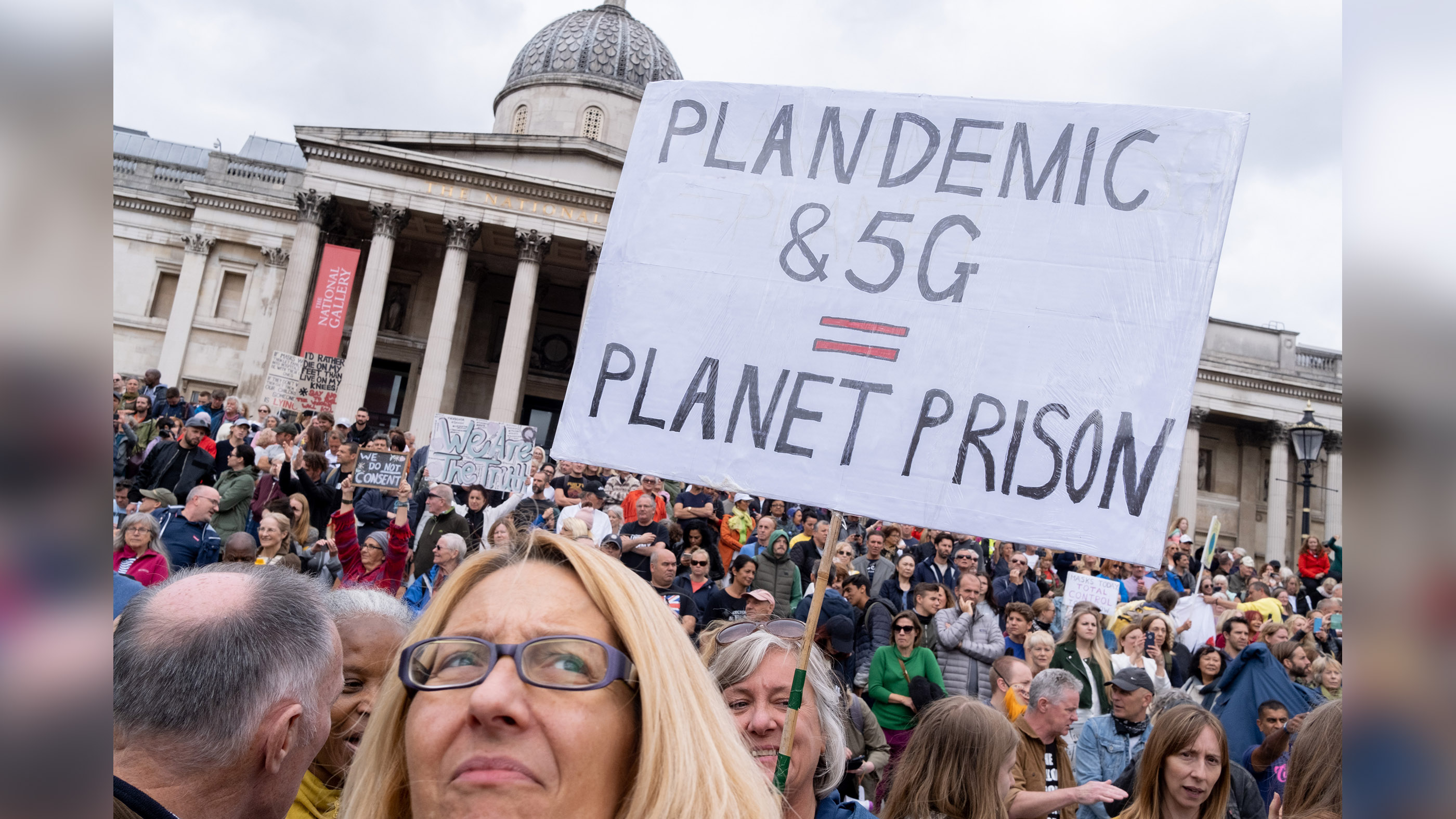 Anti-lockdown conspiracy theorists and coronavirus deniers protest in Trafalgar Square in London against the government and mainstream media who, they say, are behind disinformation and untruths about the COVID-19 pandemic, on Aug. 29, 2020.