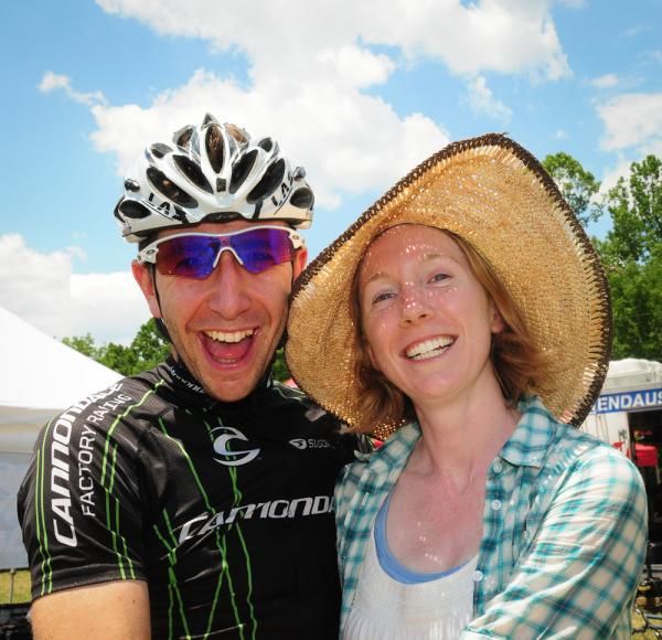 A jubilent Jeremiah Bishop at the finish with his wife Erin.