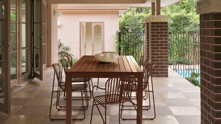 an outdoor dining setting on a checkered floor