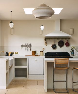 japandi neutral kitchen with multiple lighting fixtures