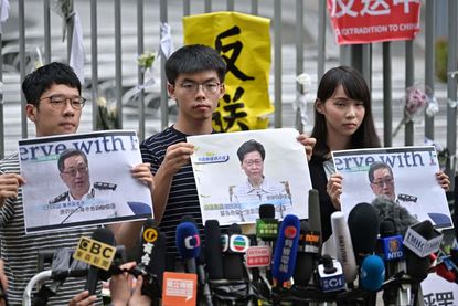 Hong Kong protest leaders Nathan Law, Joshua Wong, and Agnes Chow