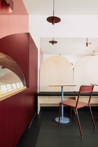 Ice-cream counter with a table and chair