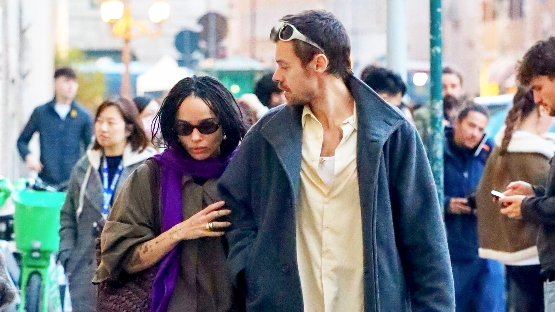 Zoe Kravitz wearing a purple scarf with Harry Styles in Rome