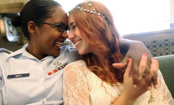 A gay couple waits to get their marriage certificate 