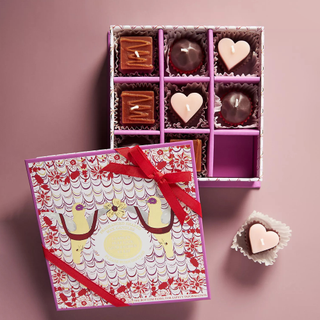 A chocolate-box shaped set of candles with truffle-shaped Valentines theme candles 