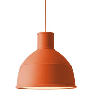 An orange pendant light fixture