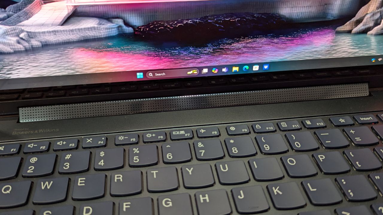 View of rotating Bowers &amp; Wilkins soundbar on Lenovo Yoga 9i Gen 9 laptop