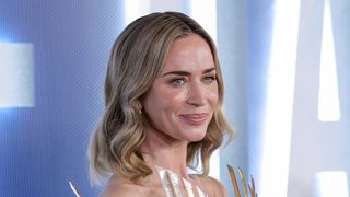 Emily Blunt smiles at photographers on the Disclosure Day New York red carpet June 8, 2026. 