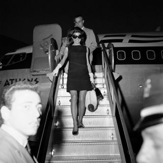 Jackie Kennedy wearing a dress in the 1960s
