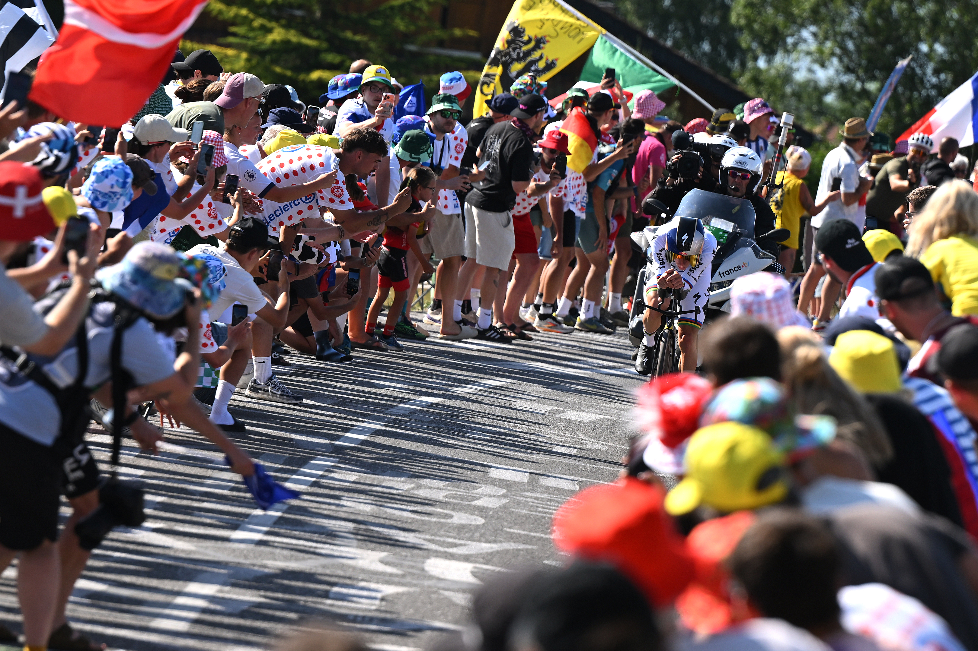 Remco Evenepoel of Belgium and Team Red Bull - BORA - hansgrohe competes while fans cheers during the 113th Tour de France 2026