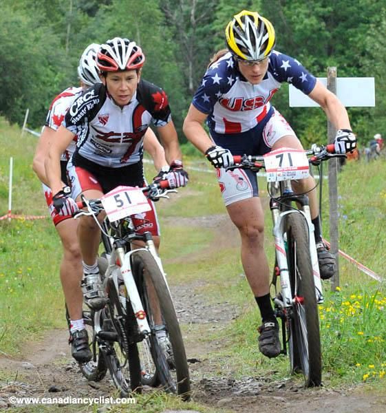 Amanda Sin and Katie Compton battle for position.