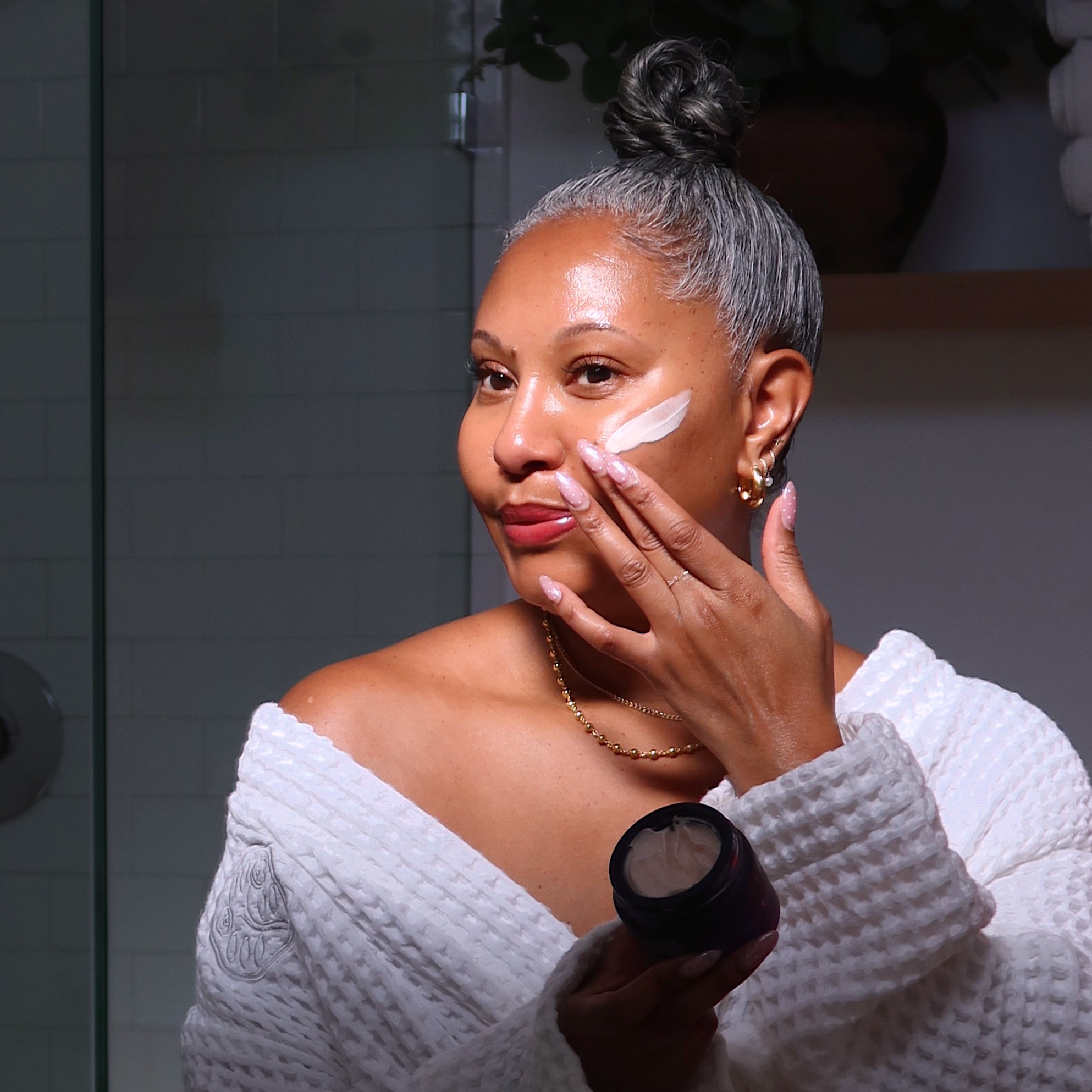 WWW Editor in Residence Tennille Jenkins applying one of her favorite moisturizers