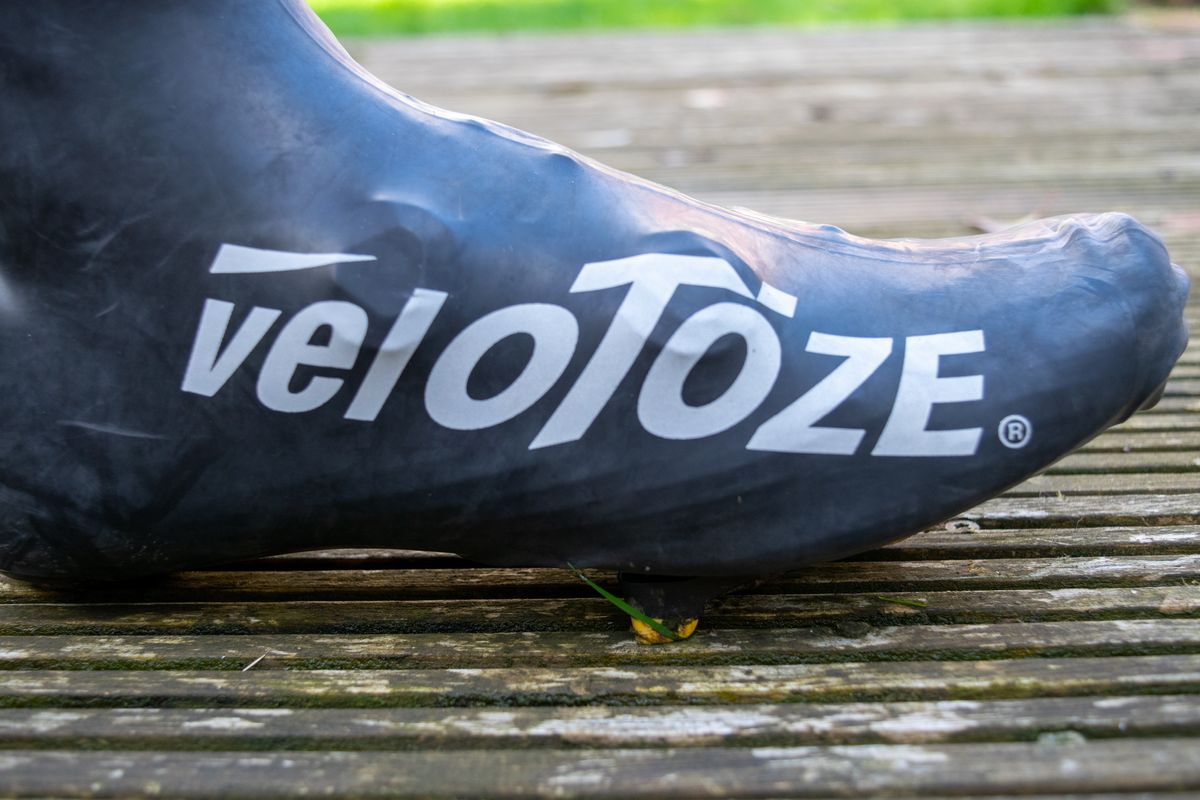 A rider wearing the Velotoze Latzex overshoes