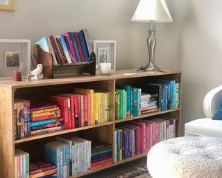 Low bookcase filled with colorful books