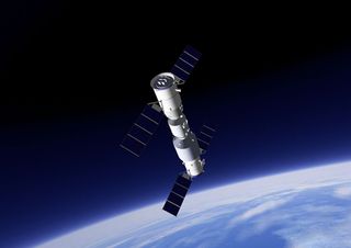 China's Tiangong-2 is designed to dock with visiting spacecraft as seen in this artist's concept, which shows the space lab (at far right) docked with a crewed Shenzhou spacecraft.