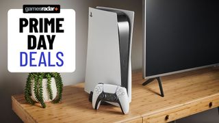 A PS5 console on a wooden table with a blue Prime Day deals badge