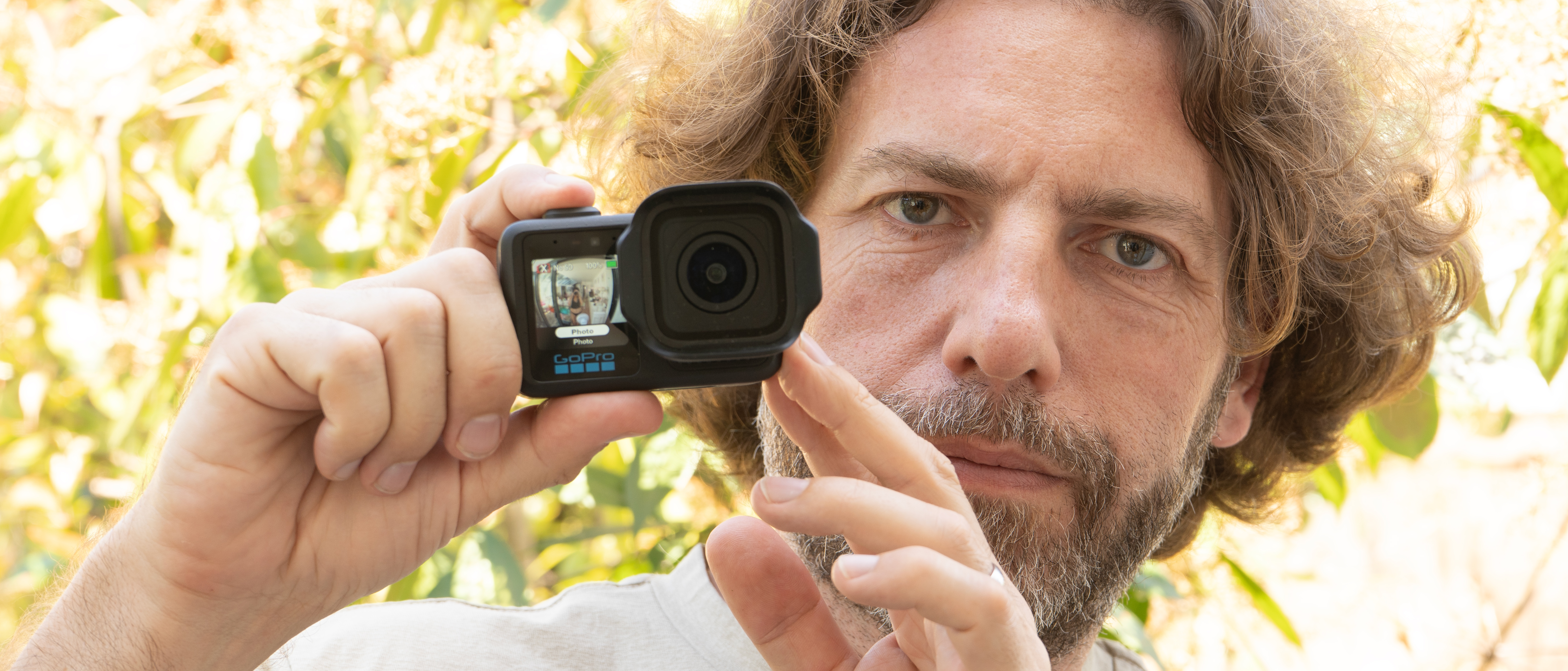 Adam Juniper holding a GoPro Mission 1 Pro camera