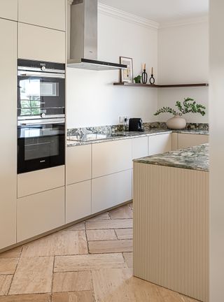 Neutral Ikea kitchen with bespoke doors