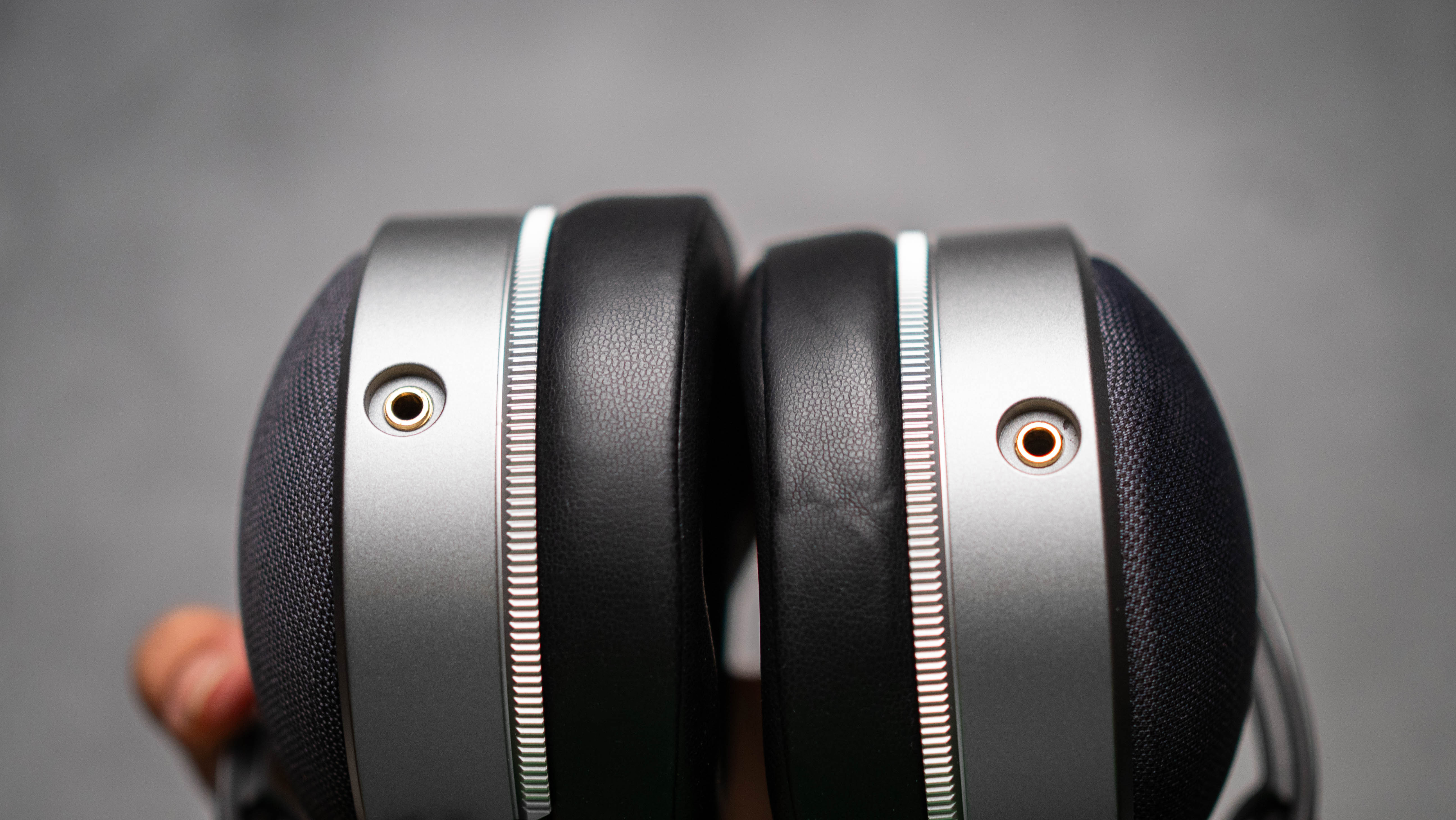 Audeze LCD-S20 planar headset in front of gray kraft sheet highlighting product design