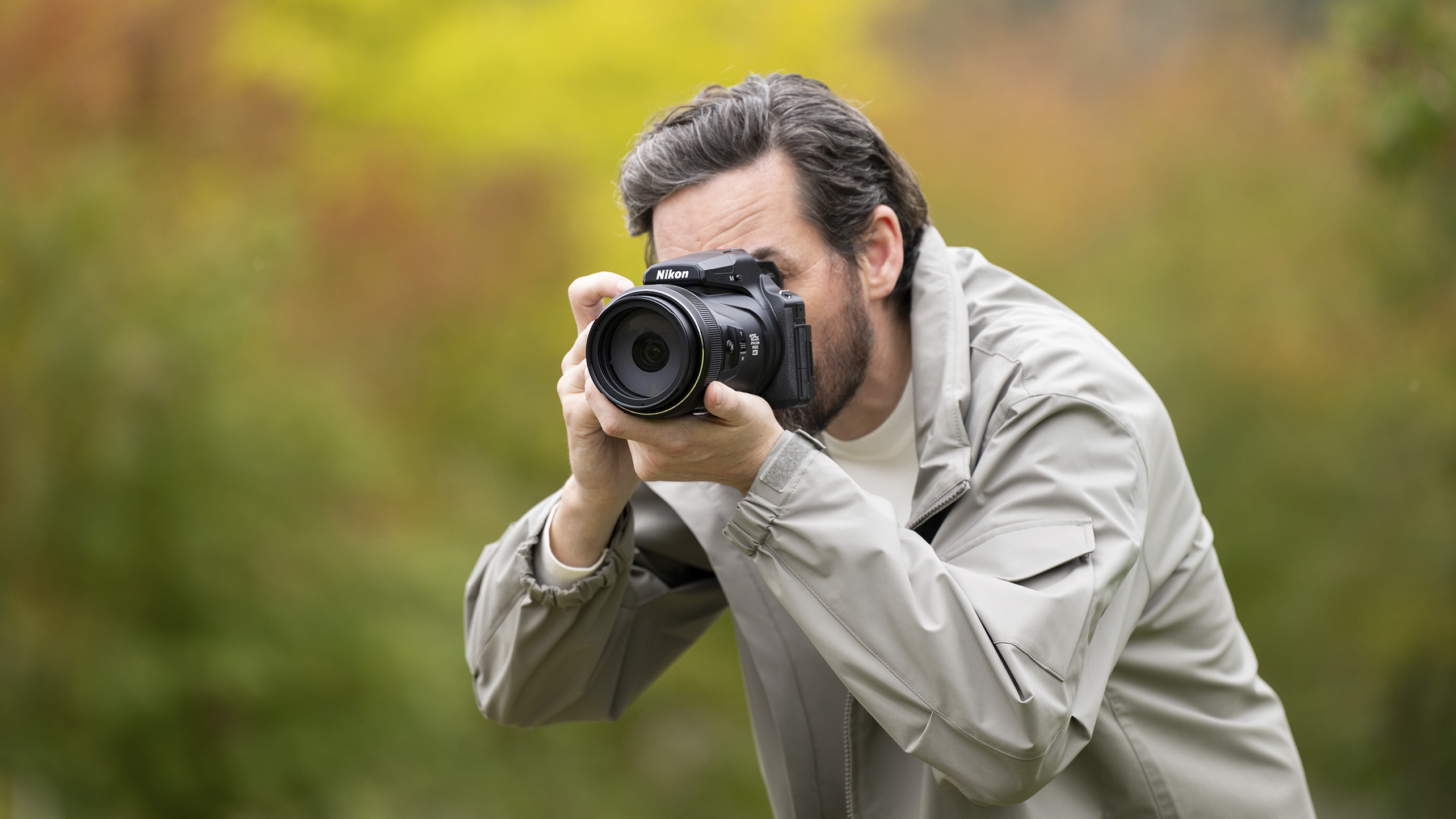 Nikon Coolpix P1100 superzoom camera in the hand