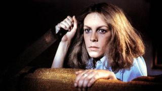 Jamie Lee Curtis as Laurie Strode with knife in 1978 Halloween