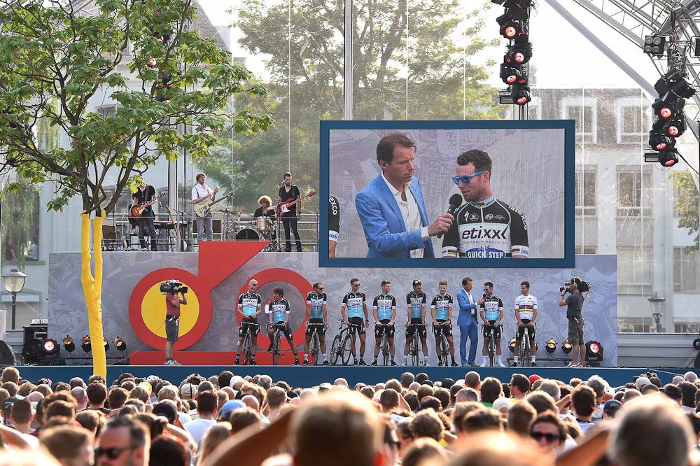 Mark Cavendish is seen on the big screen above the stage during the 2015 Tour de France team presentation in Utrecht