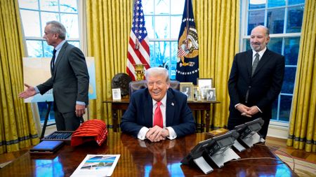 Robert Kennedy Jr., President Donald Trump and Howard Lutnick in the Oval Office