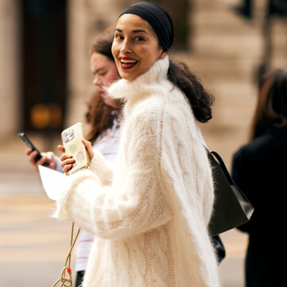 woman wearing a white sweater